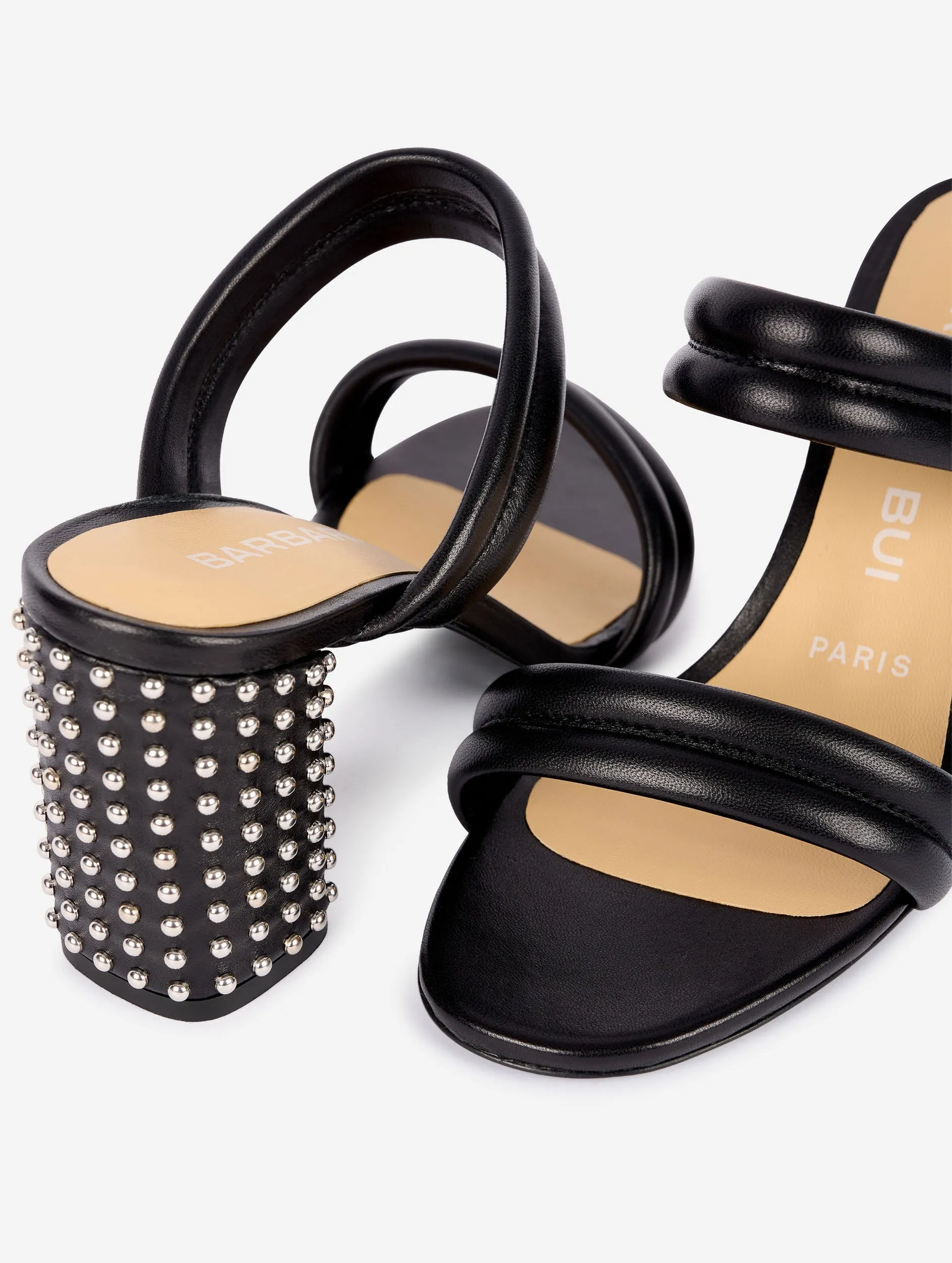 Black leather sandals with nickel studded heel