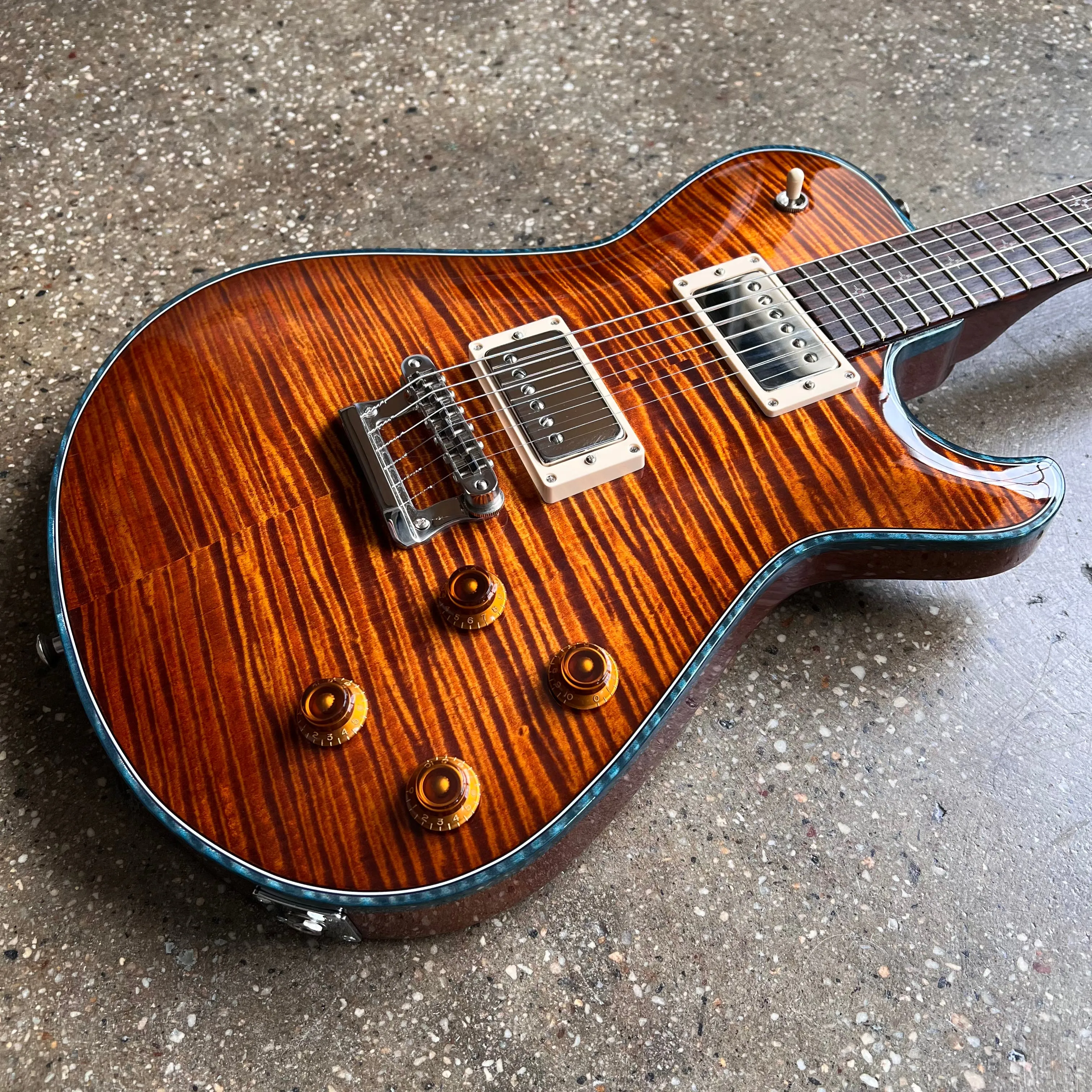 Knaggs Kenai T1 Flame Top 2022 - Aged Scotch with Teal Binding