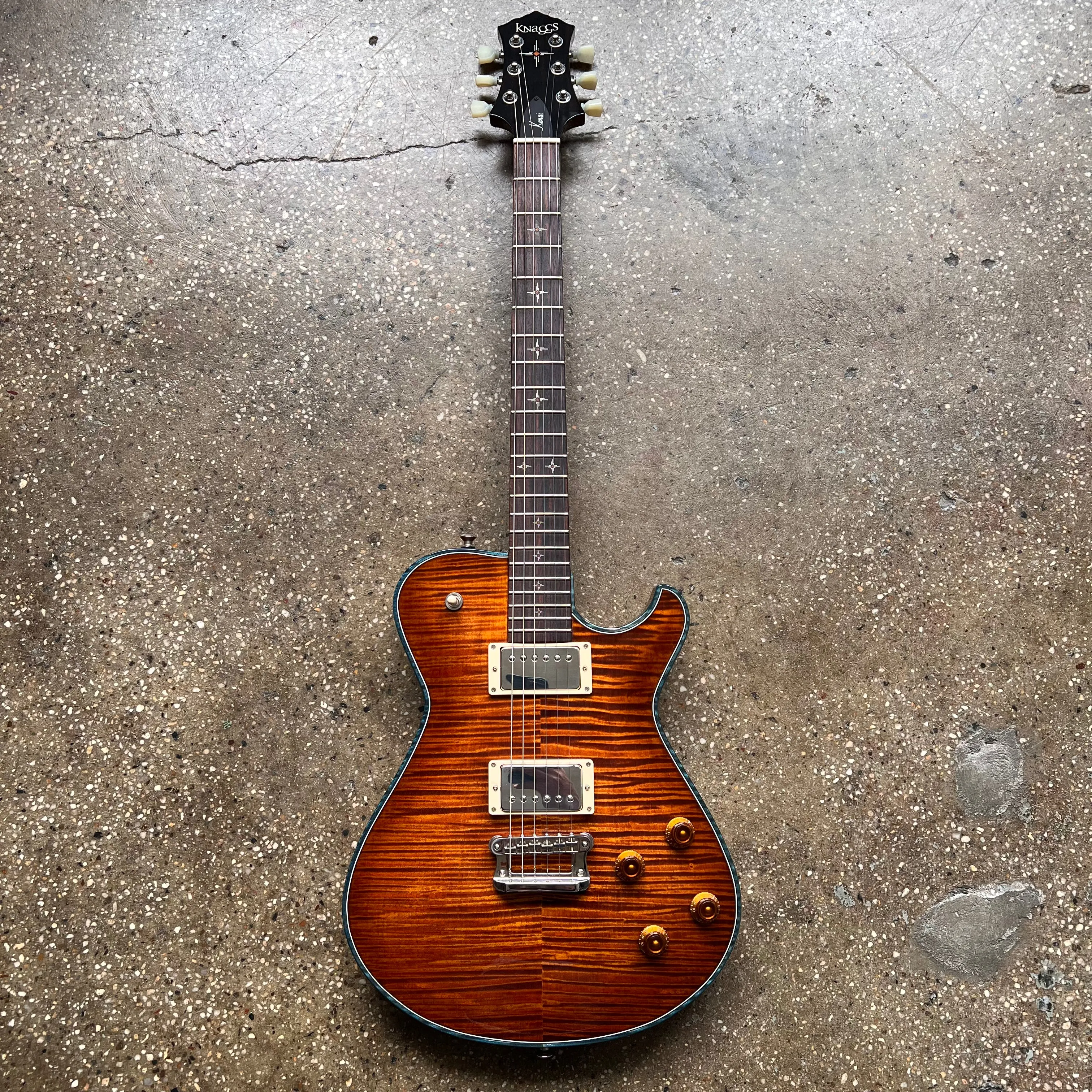 Knaggs Kenai T1 Flame Top 2022 - Aged Scotch with Teal Binding