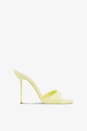Mules in light yellow patent leather