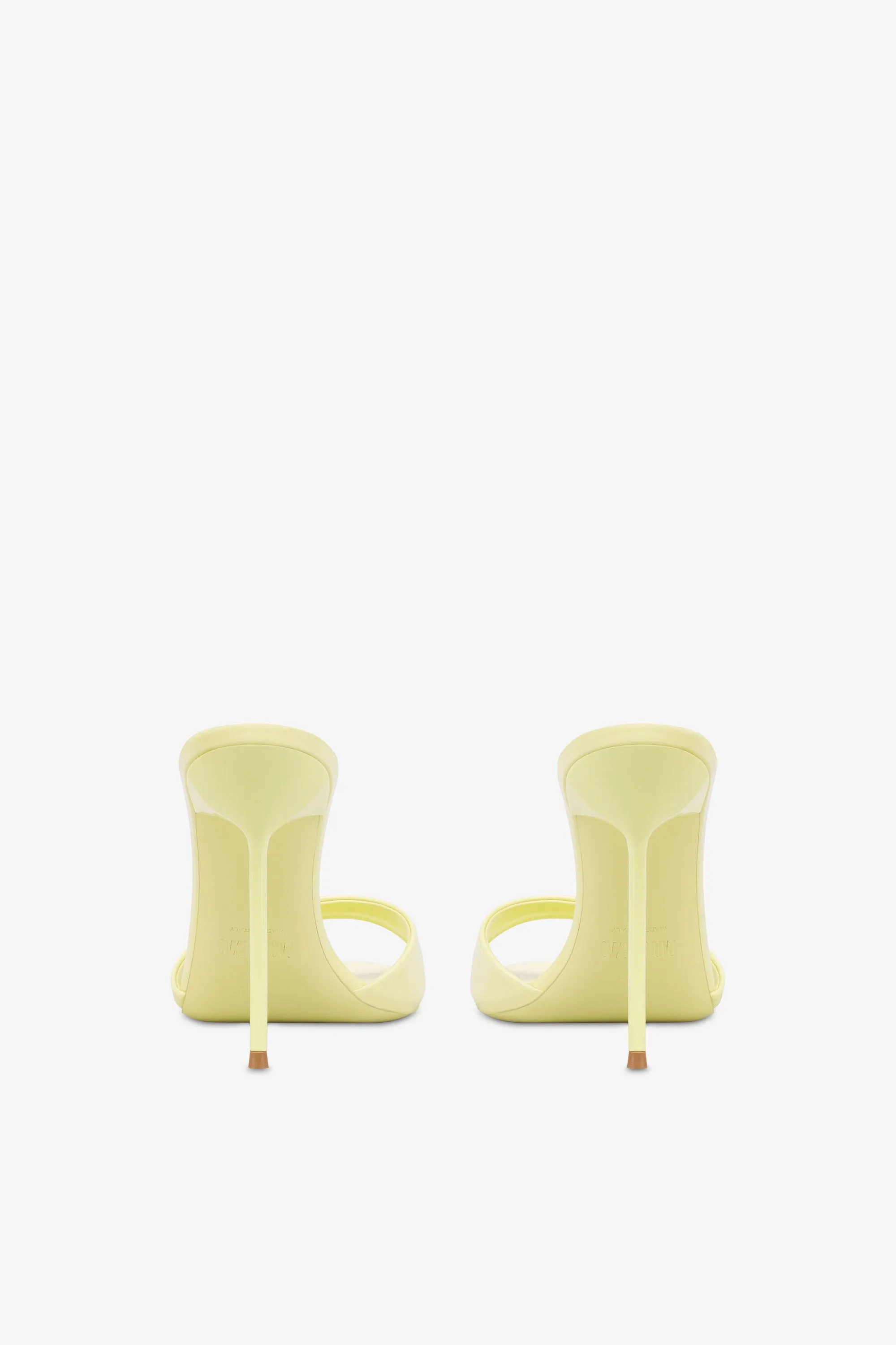 Mules in light yellow patent leather