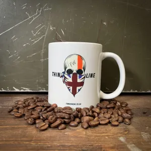 THIN ORANGE SKULL MUG